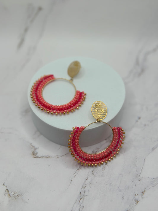 Aretes Hechos a Mano en tono Fushia
